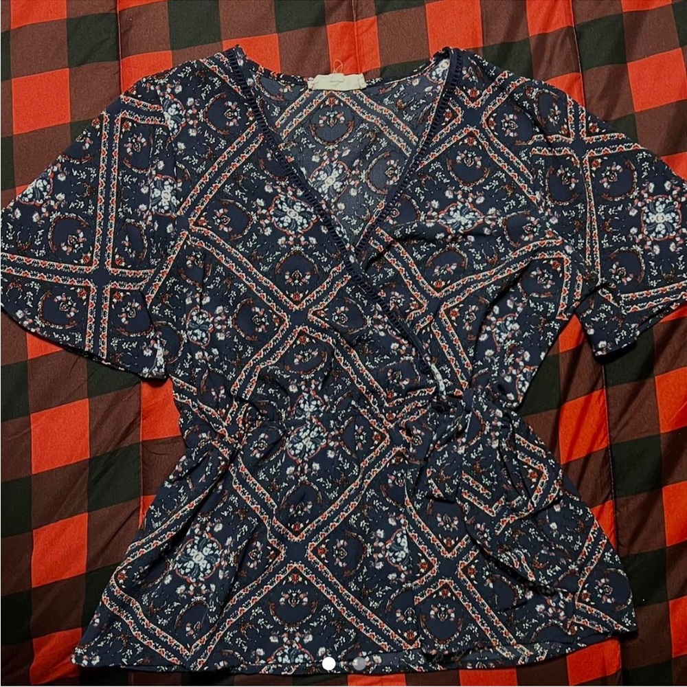 Purple blouse with flower detailing